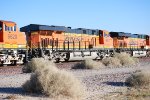 BNSF 7548 leads two ES44C4's (BNSF 6627 & BNSF 6620) into the BNSF Barstow yard pulling a eastbound Z.